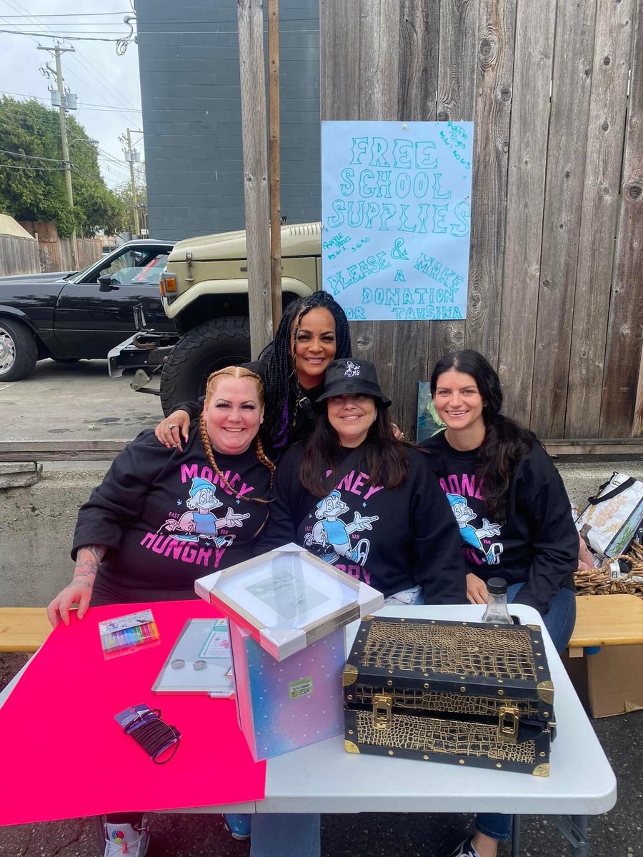 Volunteers handing out free school supplies to local families